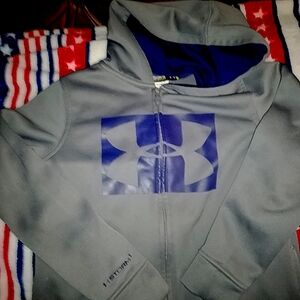 Boy's medium zip up under armour hoodie